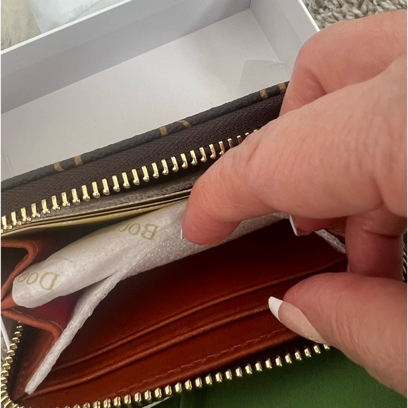 The Dooney & Bourke Greta Large Zip Around Credit Card Case - Picture 8 of 14